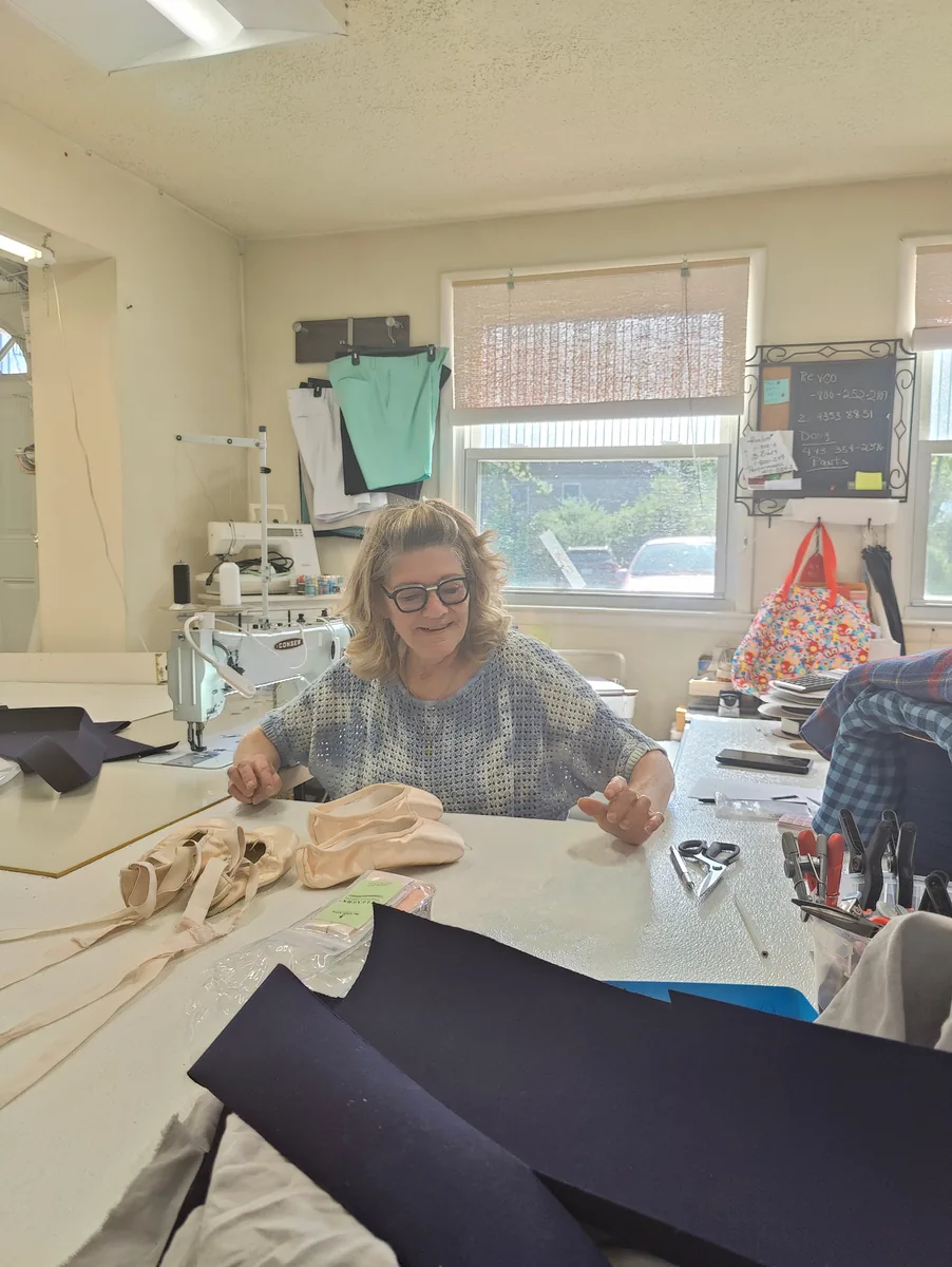 Joyce Strickland working at 6 Little Stitches